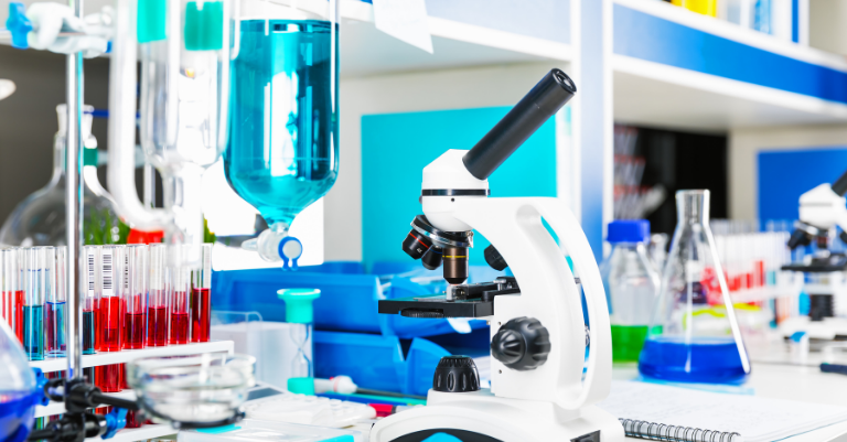 Header image: Laboratory with microscope and test tubes