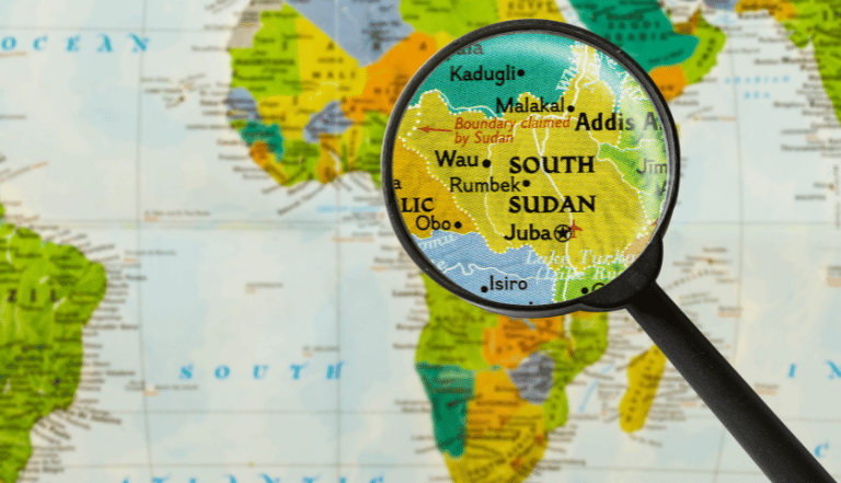 image: magnifying glass focusing on south sudan
