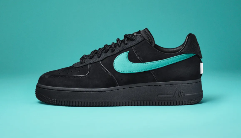 Black Nike Air Force Ones with Tiffany blue tick, against a Tiffany blue background